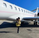 Kourtney Kardashian and Travis Barker Next to Their Private Jet
