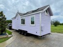 La Maisonette Lavande is a 28-foot Athena model customized to look like a French cottage