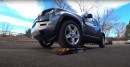 Land Rover Defender vs Toyota Highlander slip test