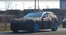 Ferrari Purosangue spied with strange hump