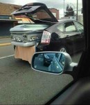 Toyota Prius with a coffin