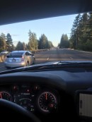 Toyota Prius in the left lane