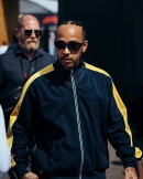 Lewis Hamilton arrives into the paddock