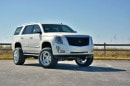 Lifted Cadillac Escalade (2015 model year) by Aspire Autosports and Dimmit Group