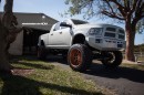 Lifted Ram 2500 On Rose Gold Wheels Meets a Horse