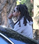 Lil Wayne Rides in Style on the Back Seat of His Maybach Landaulet