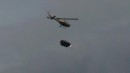 Helicopter dangling a car in London