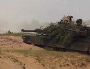 M1 Abrams firing main gun