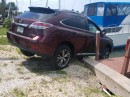 Florida man shows off his alcohol-inspired mad parking skills with a Lexus RS hanging off a pier