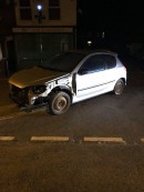 Battered Peugeot 206 caught on a public road in Norfolk