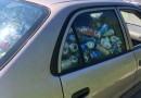 Man fills up his car with beer cans