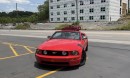 2006 Ford Mustang almost crashes as it leaves the shop