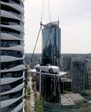 Porsche 356 Speedster lifted to a luxury condo at the 58th floor