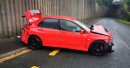 2006 Mitsubishi Evo IX in impeccable condition, totaled one day into ownership