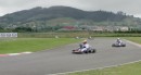 McLaren Formula One Champions drive go-karts on track