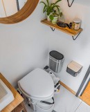 Domek is a custom tiny house with a gorgeous atrium shower and every creature comfort of an actual house