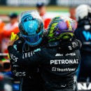Lewis Hamilton and George Russell celebrate after the British Grand Prix