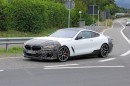 BMW M850i prototype with mid-engine camouflage (not actually mid-engined)
