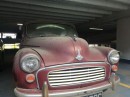A 1965 Morris Minor 1000 has been sitting in a paid parking center for years