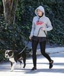 Miley Cyrus uses her Porsche Cayenne GTS to walk the dog