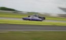Purple Chevy Camaro battles purple Ford F-150