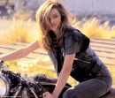 Model Miranda Kerr Rides a Honda Classic
