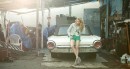Models Posing Next to Classics Fords and Chevys