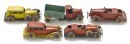 A Tootsietoy lot, features trucks, limousines, and others. In "played with" condition