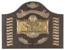'The Bluebird Trophy' award, England, circa 1933, this award, from the Sydenham Motor Club, was won by G.P. Harvey Noble, with an embossed image of Sir Malcolm Campbell's Bluebird at speed surrounded by angels, a series of small name plaque