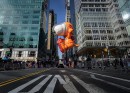 Astronaut Snoopy floating over New York