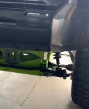Lifted Toyota Tundra neon lime green SEMA build by camberedcustoms