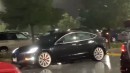 Tesla in the rain