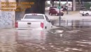 Driver floods pickup truck under a bridge