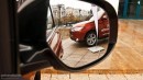 2013 Mitsubishi Outlander in rear view mirror