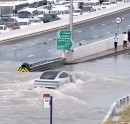Porsche Taycan drives through deep water in Dubai