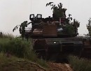 M1 Abrams firing main gun