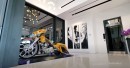 ONE100 mansion comes with Rolls-Royce, Ferrari in the garage, a custom Harley-Davidson as "art"