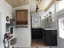 Rustic but modern tiny house packs a lot of features inside a very compact floorspace