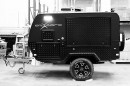 Smart, electrified trailer prototype from OzXCorp that can tow, park itself