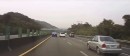 Scared driver veers into lane divider out of fear of accident