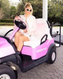 Paris Hilton and Pink Golf Cart