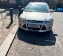 Dad claims he's been fined for parking his car's shadow in a disabled spot