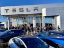 People gathered at Tesla showrooms to see the Cybertruck