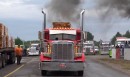 Peterbilt 379 racing semi truck takes on several rivals during straight line event