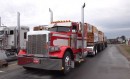 Peterbilt 379 racing semi truck takes on several rivals during straight line event