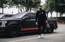 Ben Simmons poses next to his Shelby F-150 Super Snake