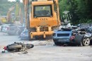 Smuggled Supercars Getting Crushed with Buldozers in Phillipines