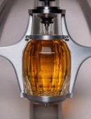 Philos is a sculptural piece for a superyacht, hiding a gimbal decanter for the world's most precious whiskey