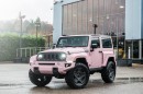 Kahn Design Jeep Wrangler in textured pink paint by the Chelsea Truck Company