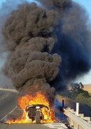 Polaris Slingshot burning on highway